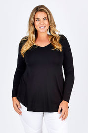 Model Fiona wearing size 16 of the Long Sleeve Softly Swinging Bamboo Tee in colour Black (Black), from the front, cropped image