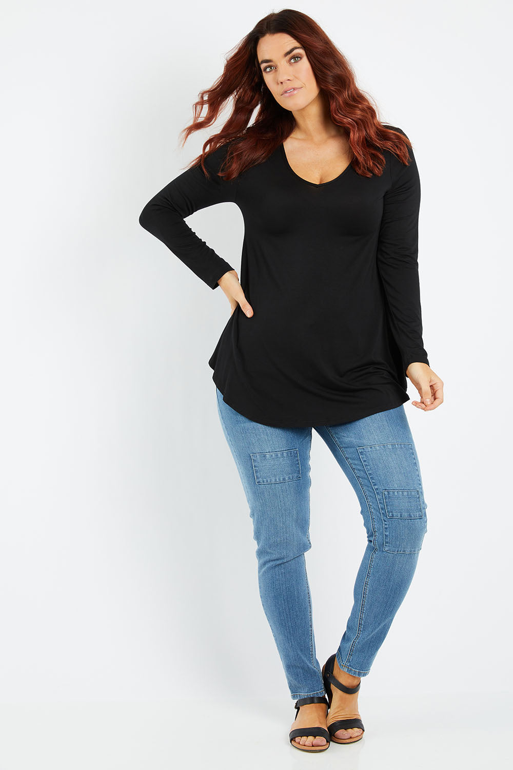 Model Laura wearing size 14 of the Long Sleeve Softly Swinging Bamboo Tee in colour Black (Black), from the front, showing the whole outfit