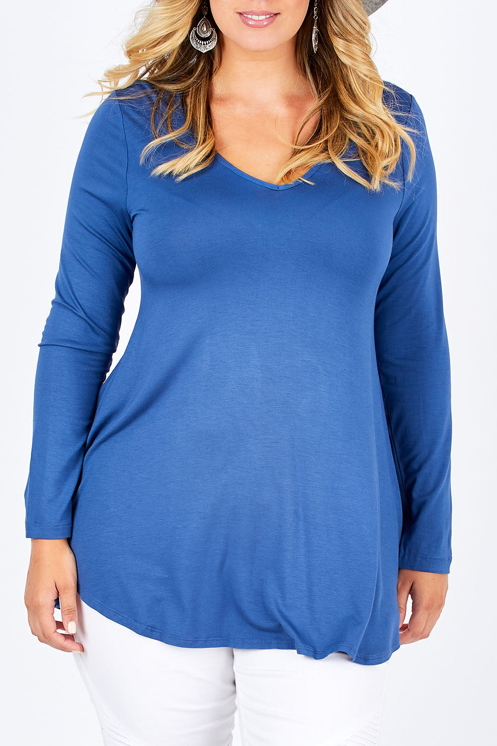 Model Jess wearing size 14 of the Long Sleeve Softly Swinging Bamboo Tee in colour BlueJeans (Blue), from the front, cropped image