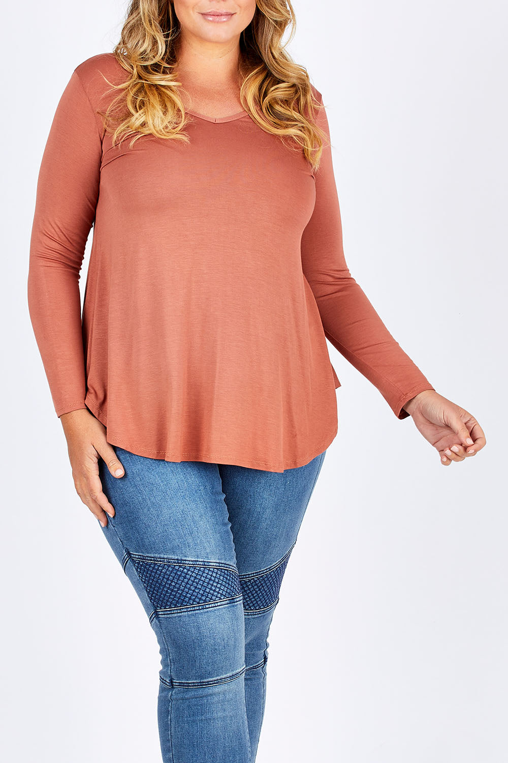 Model Fiona wearing size 16 of the Long Sleeve Softly Swinging Bamboo Tee in colour Copper, from the front, cropped image