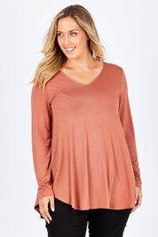 Model Jess wearing size 14 of the Long Sleeve Softly Swinging Bamboo Tee in colour Copper, from the front, cropped image