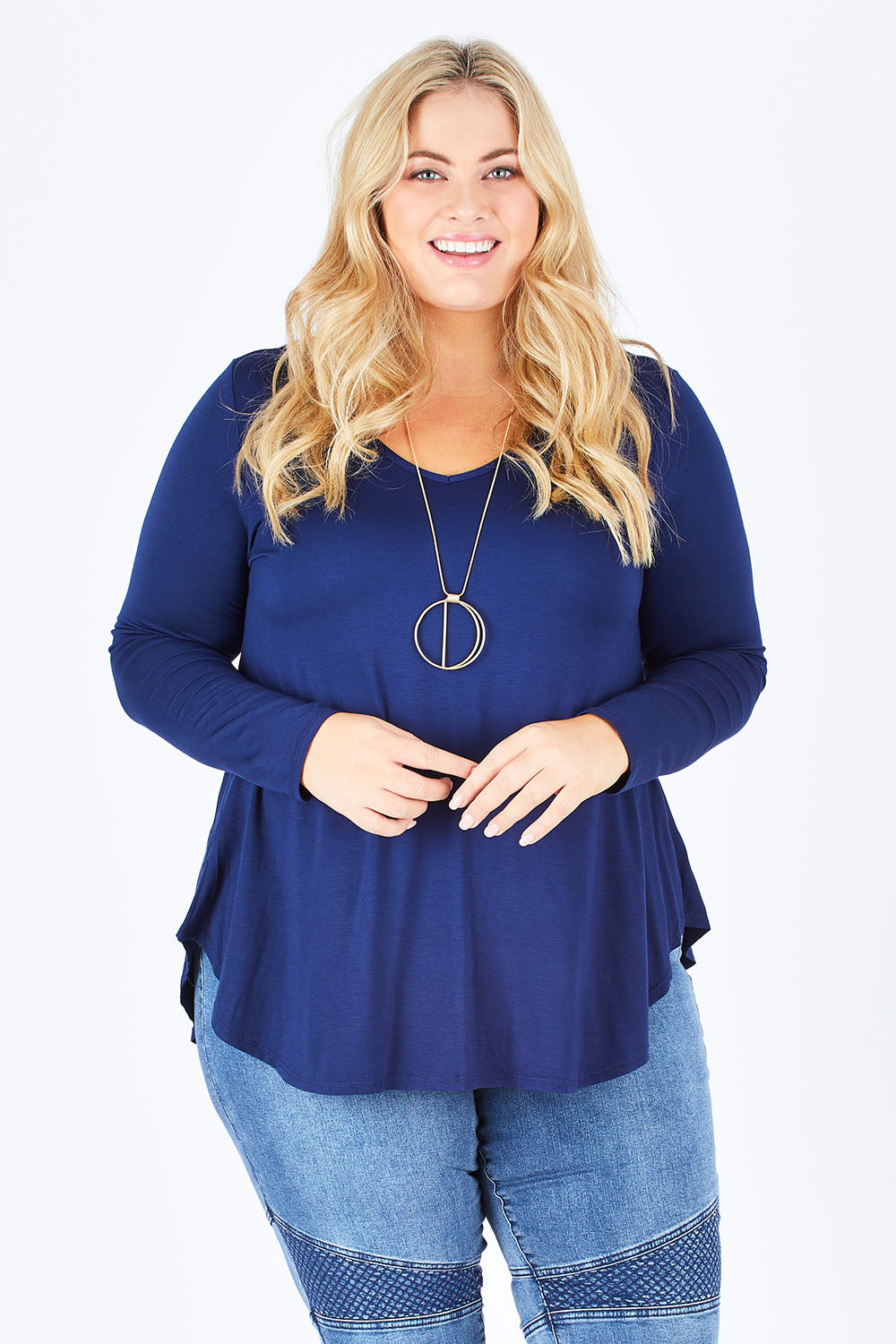 Model Sophie wearing size 18 of the Long Sleeve Softly Swinging Bamboo Tee in colour Navy (Blue), from the front, cropped image