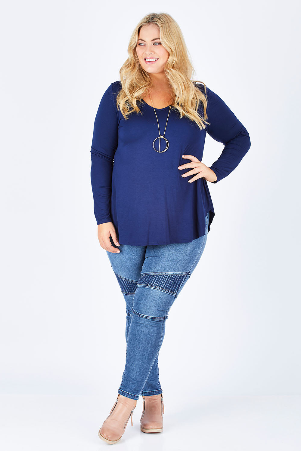 Model Sophie wearing size 18 of the Long Sleeve Softly Swinging Bamboo Tee in colour Navy (Blue), from the front, showing the whole outfit