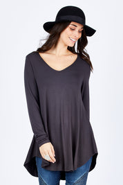 Model Georgia wearing size 10 of the Long Sleeve Softly Swinging Bamboo Tee in colour Storm (Grey), from the front, cropped image
