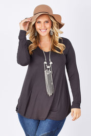 Model Jess wearing size 14 of the Long Sleeve Softly Swinging Bamboo Tee in colour Storm (Grey), from the front, cropped image