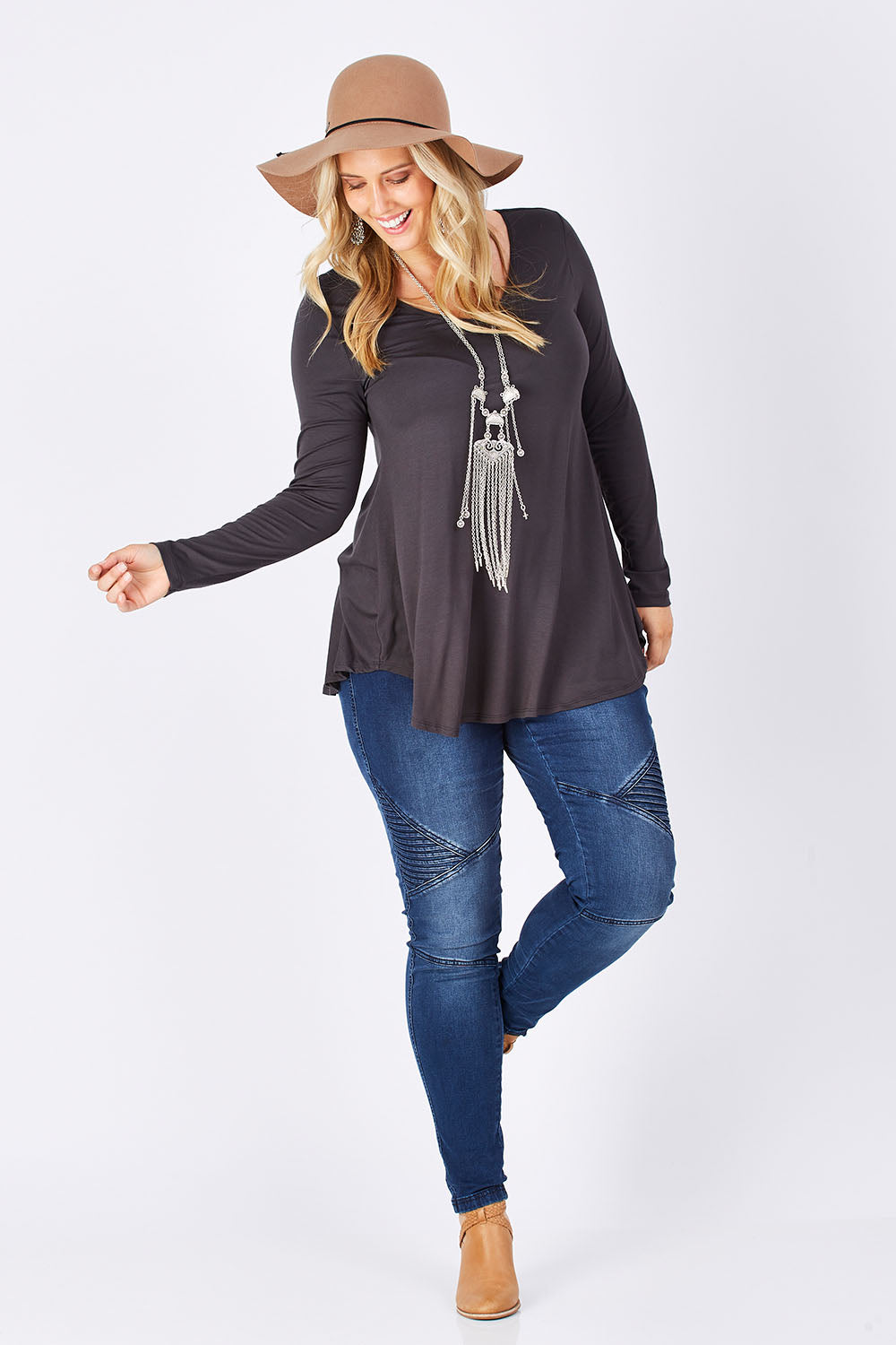 Model Jess wearing size 14 of the Long Sleeve Softly Swinging Bamboo Tee in colour Storm (Grey), from the front, showing the whole outfit