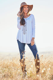 Model Emma wearing size 10 of the Long Sleeve Softly Swinging Bamboo Tee in colour White (White), from the front, showing the whole outfit