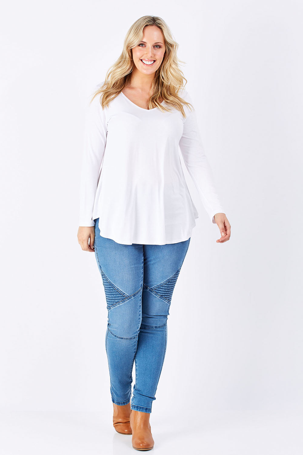 Model Jess wearing size 14 of the Long Sleeve Softly Swinging Bamboo Tee in colour White (White), from the front, showing the whole outfit