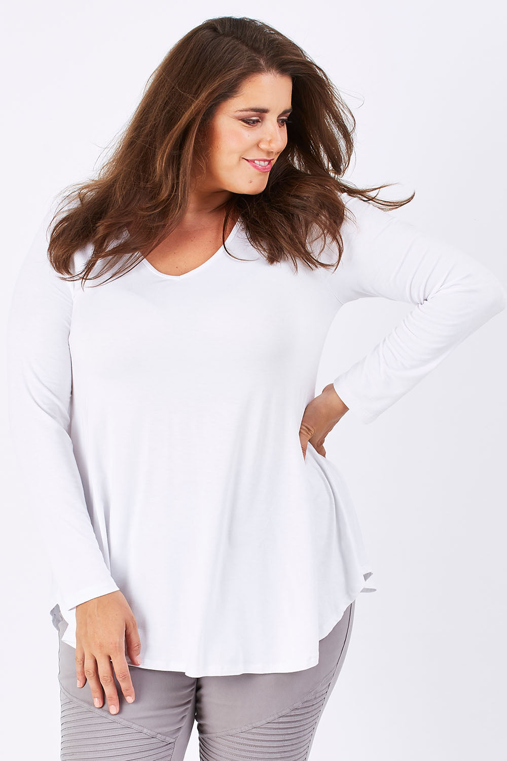 Model Mae wearing size 18 of the Long Sleeve Softly Swinging Bamboo Tee in colour White (White), from the front, cropped image