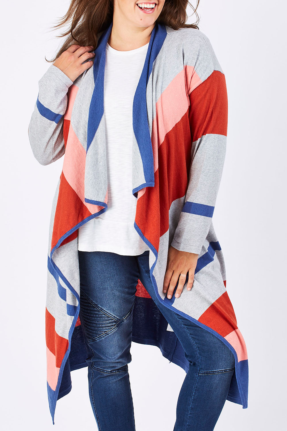 Model Mae wearing size XL of the Tribal Colours Cardigan in colour Rainbow (Grey), from the front, showing the whole outfit