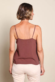 Model Riinar wearing size 10 of the Runaway Top – Chocolate in colour Chocolate, from the back