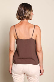 Model Riinar wearing size 10 of the Runaway Top – Chocolate in colour Chocolate, from the back