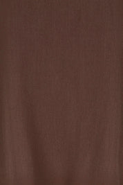 Product shot of the Runaway Top – Chocolate in colour Chocolate, showing detail