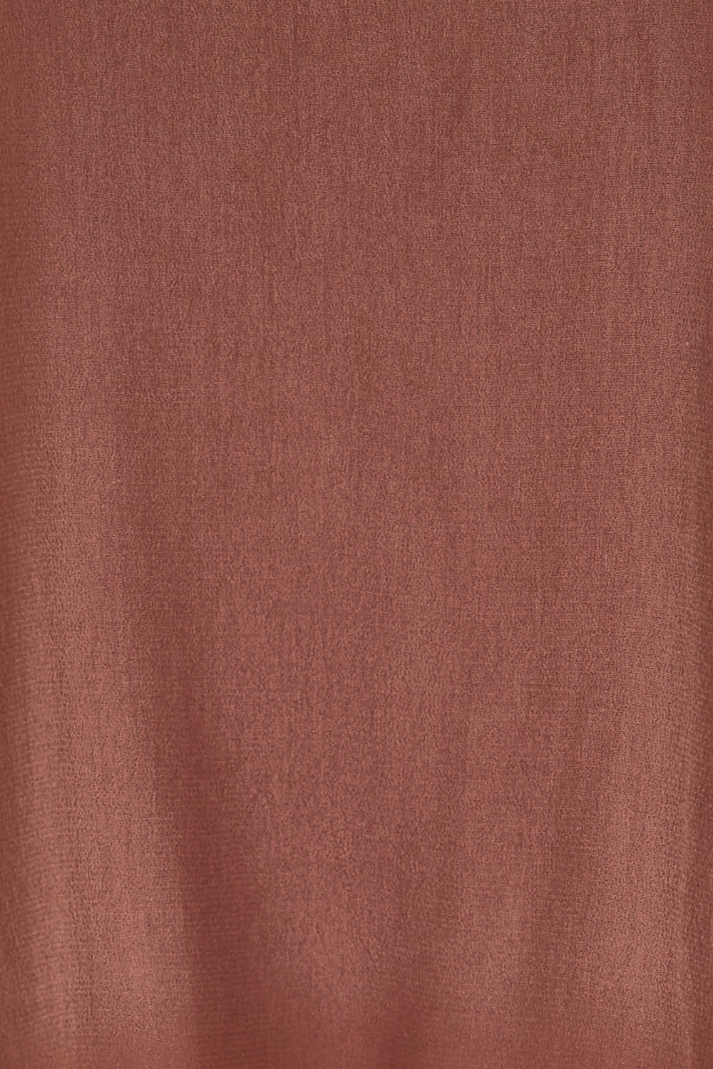 Product shot of the Runaway Top – Chocolate in colour Chocolate, showing detail