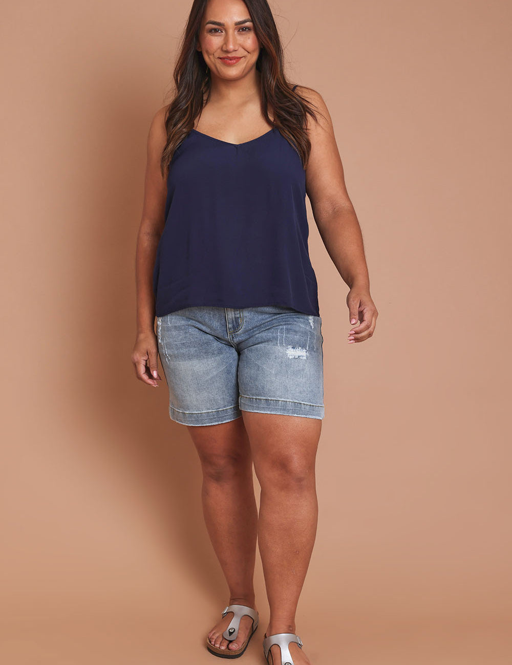 Model Ashleigh wearing size 16 of the Runaway Top in colour Darknavy (Blue), from the front, showing the whole outfit