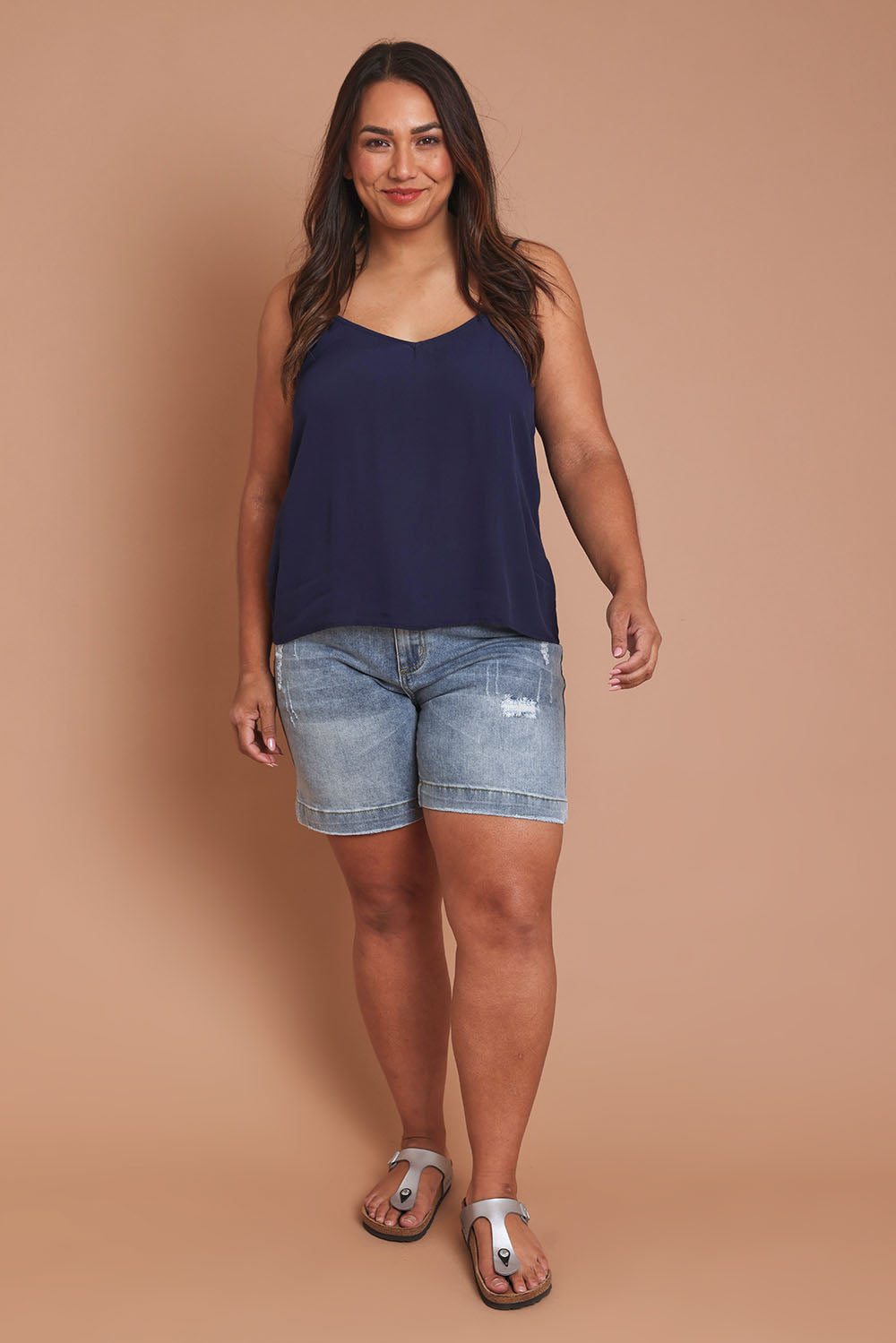Model Ashleigh wearing size 16 of the Runaway Top in colour Darknavy (Blue), from the front, showing the whole outfit