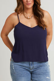 Model Laura wearing size 14 of the Runaway Top in colour Darknavy (Blue), from the front, cropped image