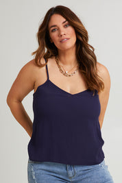 Model Laura wearing size 14 of the Runaway Top in colour Darknavy (Blue), from the front, cropped image