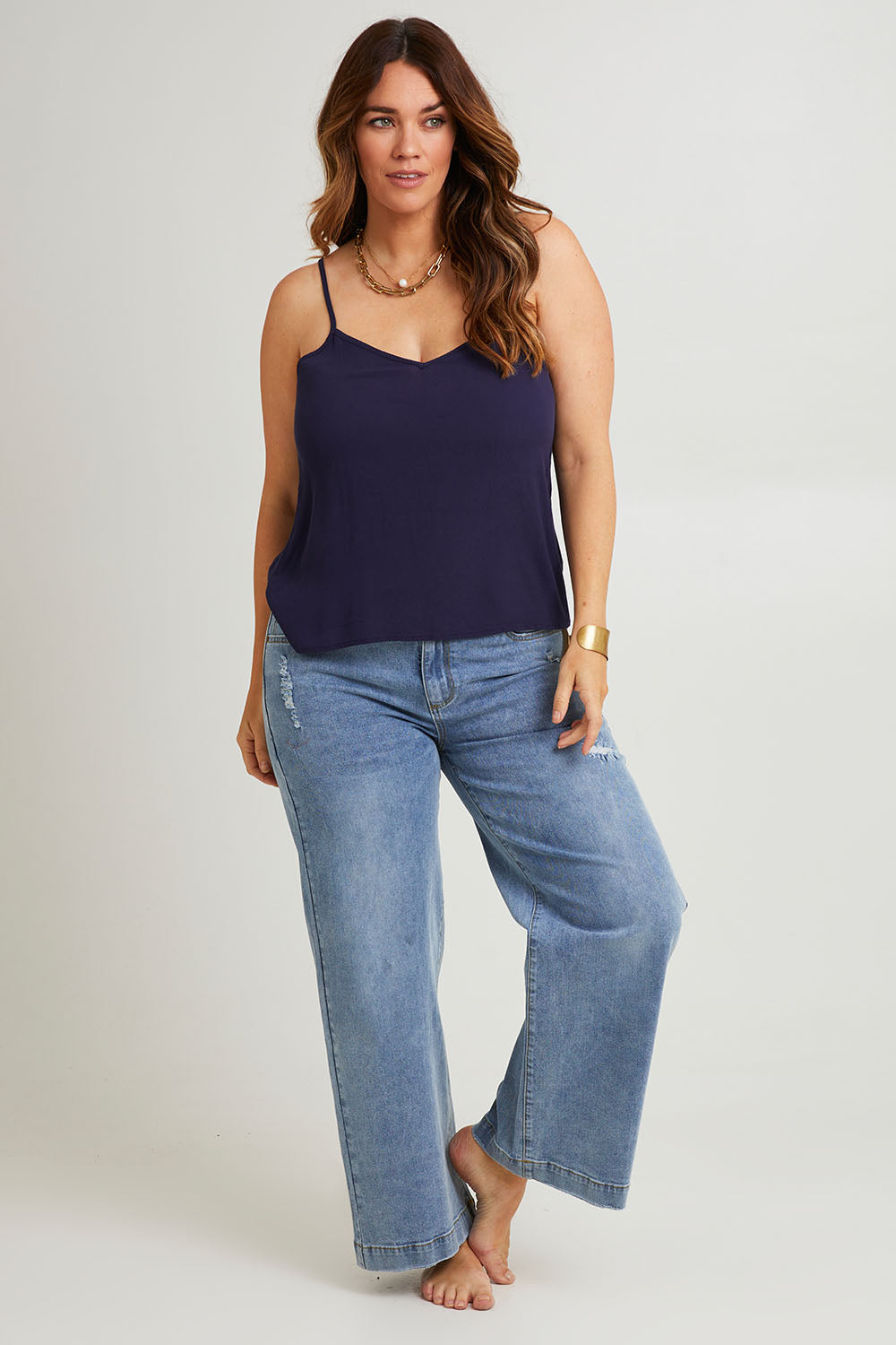 Model Laura wearing size 14 of the Runaway Top in colour Darknavy (Blue), from the front, showing the whole outfit