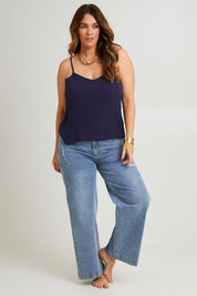 Model Laura wearing size 14 of the Runaway Top in colour Darknavy (Blue), from the front, showing the whole outfit