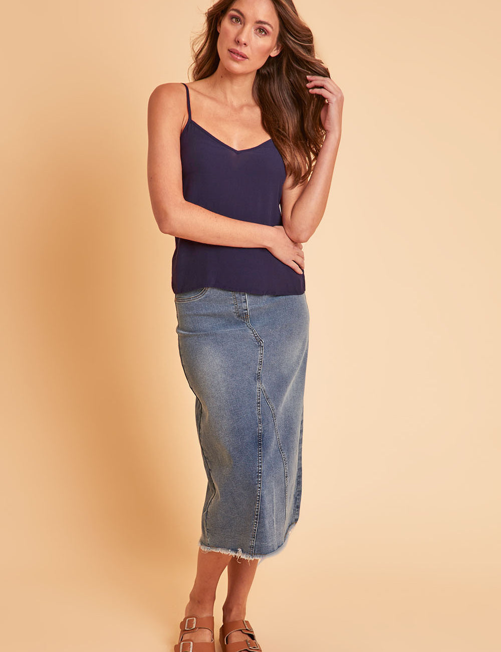 Model Madeline wearing size 10 of the Runaway Top in colour Darknavy (Blue), from the front, showing the whole outfit