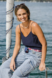 Model Tegan wearing size 10 of the Runaway Top in colour Darknavy (Blue), from the front, showing the whole outfit