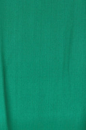 Product shot of the Runaway Top – Emerald in colour Emerald, showing detail