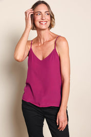 Model Riinar wearing size 10 of the Runaway Top – Plum in colour Plum, in a cropped view