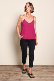 Model Riinar wearing size 10 of the Runaway Top – Plum in colour Plum, from the front