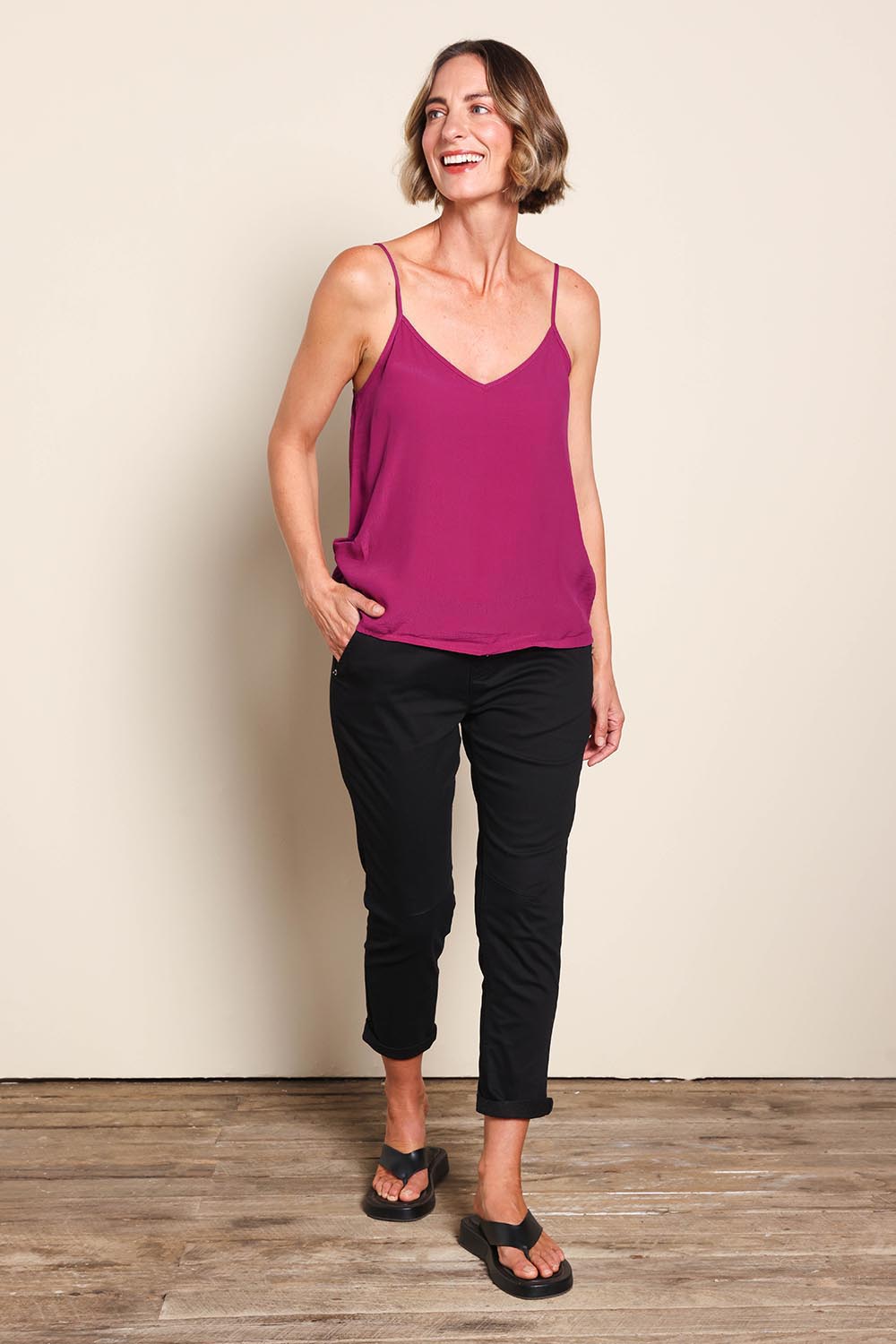 Model Riinar wearing size 10 of the Runaway Top – Plum in colour Plum, from the front