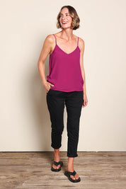 Model Riinar wearing size 10 of the Runaway Top – Plum in colour Plum, from the front