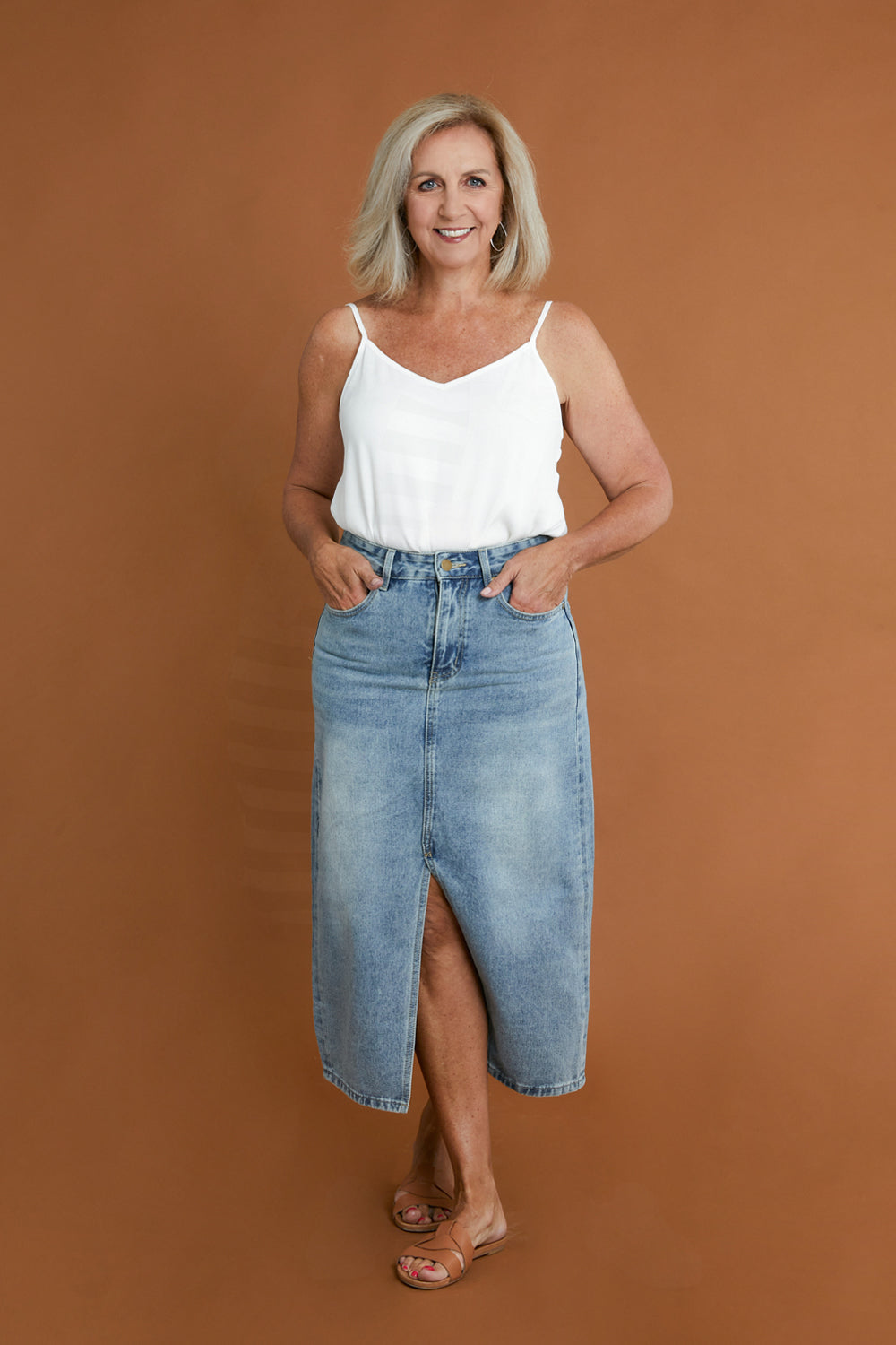 Model Sandy wearing size 12 of the Runaway Top in colour White (White), from the front, showing the whole outfit