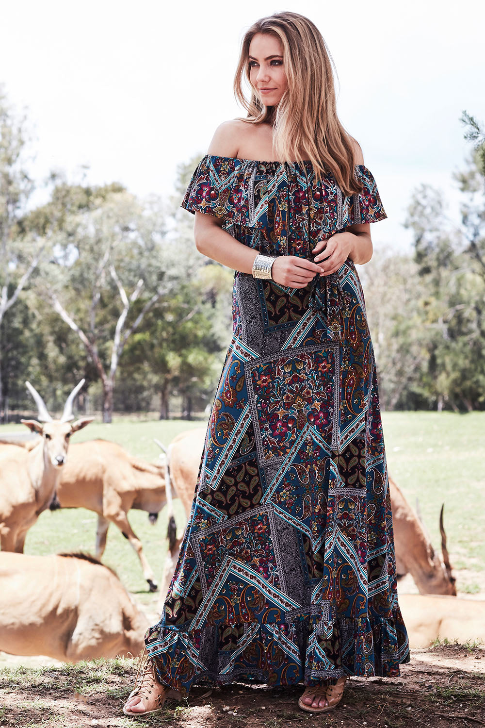 Model Marnee wearing size 10 of the Dancing In The Rain Dress in colour Patch (Blue), from the front, showing the whole outfit