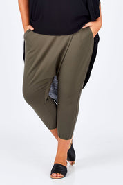 Model Fiona wearing size 16 of the Relax With Me Pants in colour Olive (Green), from the front, cropped image