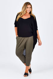 Model Fiona wearing size 16 of the Relax With Me Pants in colour Olive (Green), from the front, showing the whole outfit