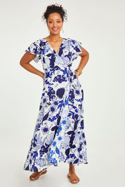 Model Noli wearing size 14 of the Bellezza Maxi Dress in colour Blues (Blue), from the front, showing the whole outfit