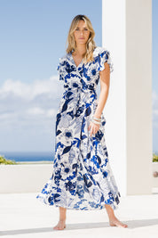 Model Tegan wearing size 10 of the Bellezza Maxi Dress in colour Blues (Blue), from the front, showing the whole outfit