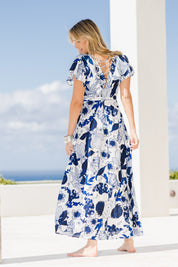 Model Tegan wearing size 10 of the Bellezza Maxi Dress in colour Blues (Blue), from the front, showing the whole outfit