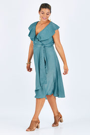 Model Palatina wearing size 14 of the Amore Wrap Dress in colour Teal (Green), from the front, showing the whole outfit