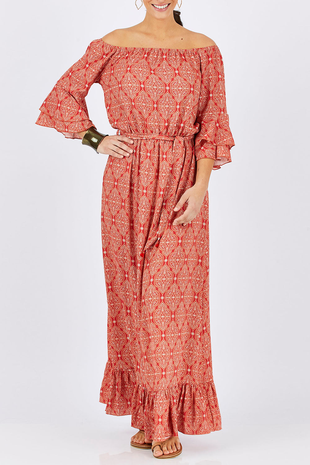 Model Georgia wearing size 10 of the In Light Of The Sun Maxi in colour Red (Red), from the front, cropped image
