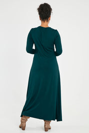 Model Noli wearing size 14 of the My Faithful Maxi Tee Dress in colour Juniper (Green), from the back