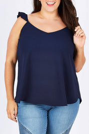Model Mae wearing size 18 of the Romance All Around Top in colour Navy (Blue), from the front, cropped image