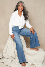 Model Nadine wearing size 10 of the Happy Me Wide Leg Jeans in colour Denim (Blue), from the front, showing the whole outfit