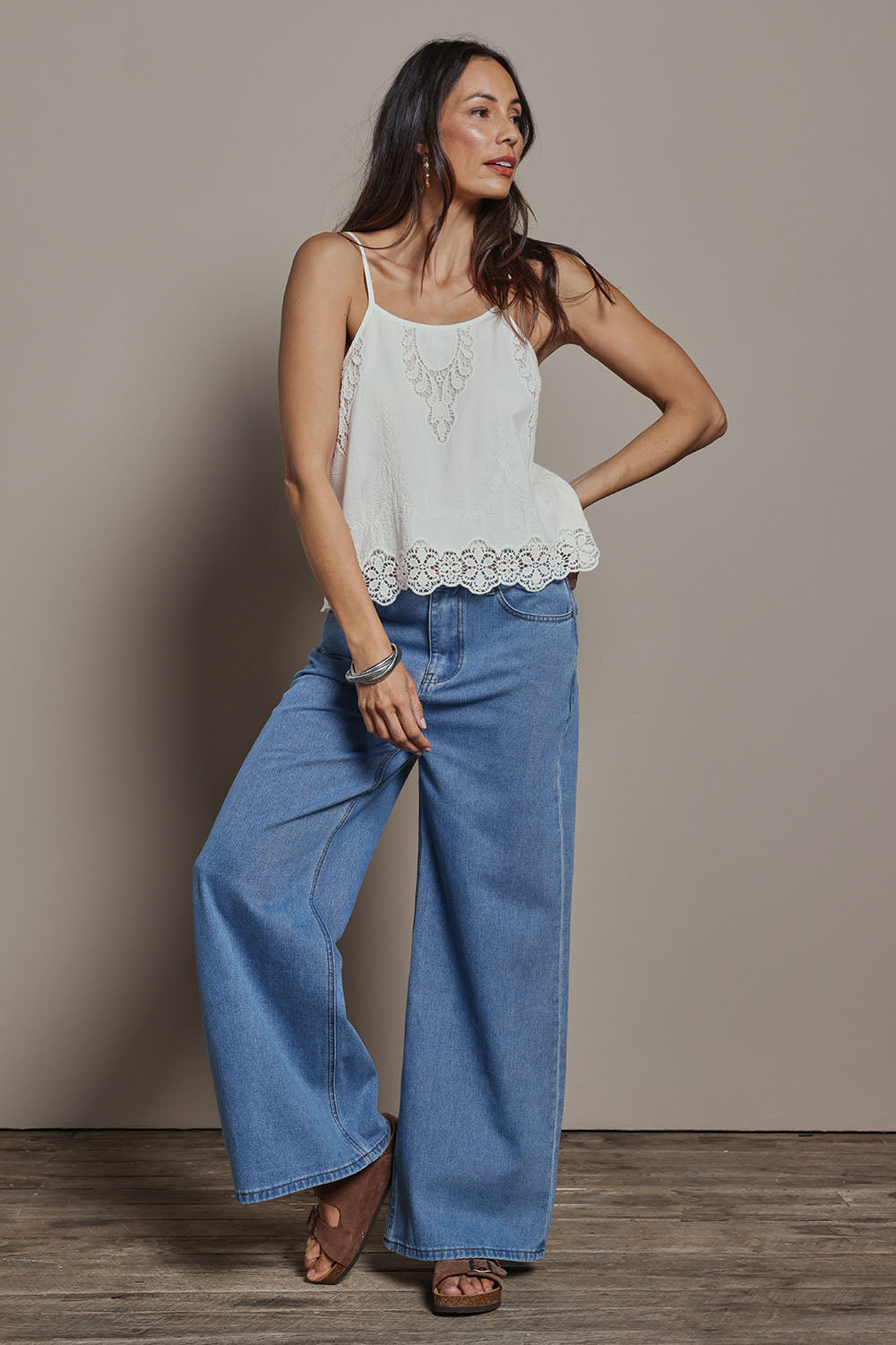 Model Amanda wearing size 10 of the Happy Me Wide Leg Jeans in colour Lightdenim (Blue), from the front, showing the whole outfit