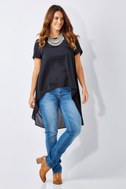 Model Laura wearing size 12 of the Walking On Clouds Tee in colour JetBlack (Black), from the front, showing the whole outfit