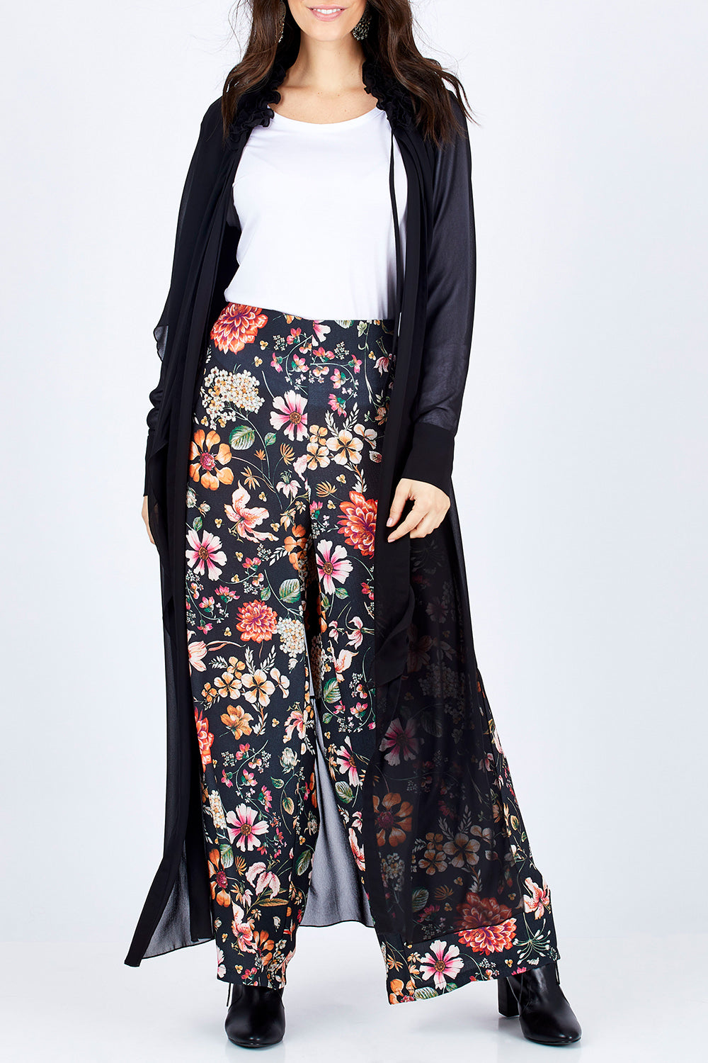 Model Georgia wearing size 10 of the Breezing Along Duster in colour Black (Black), from the front, cropped image