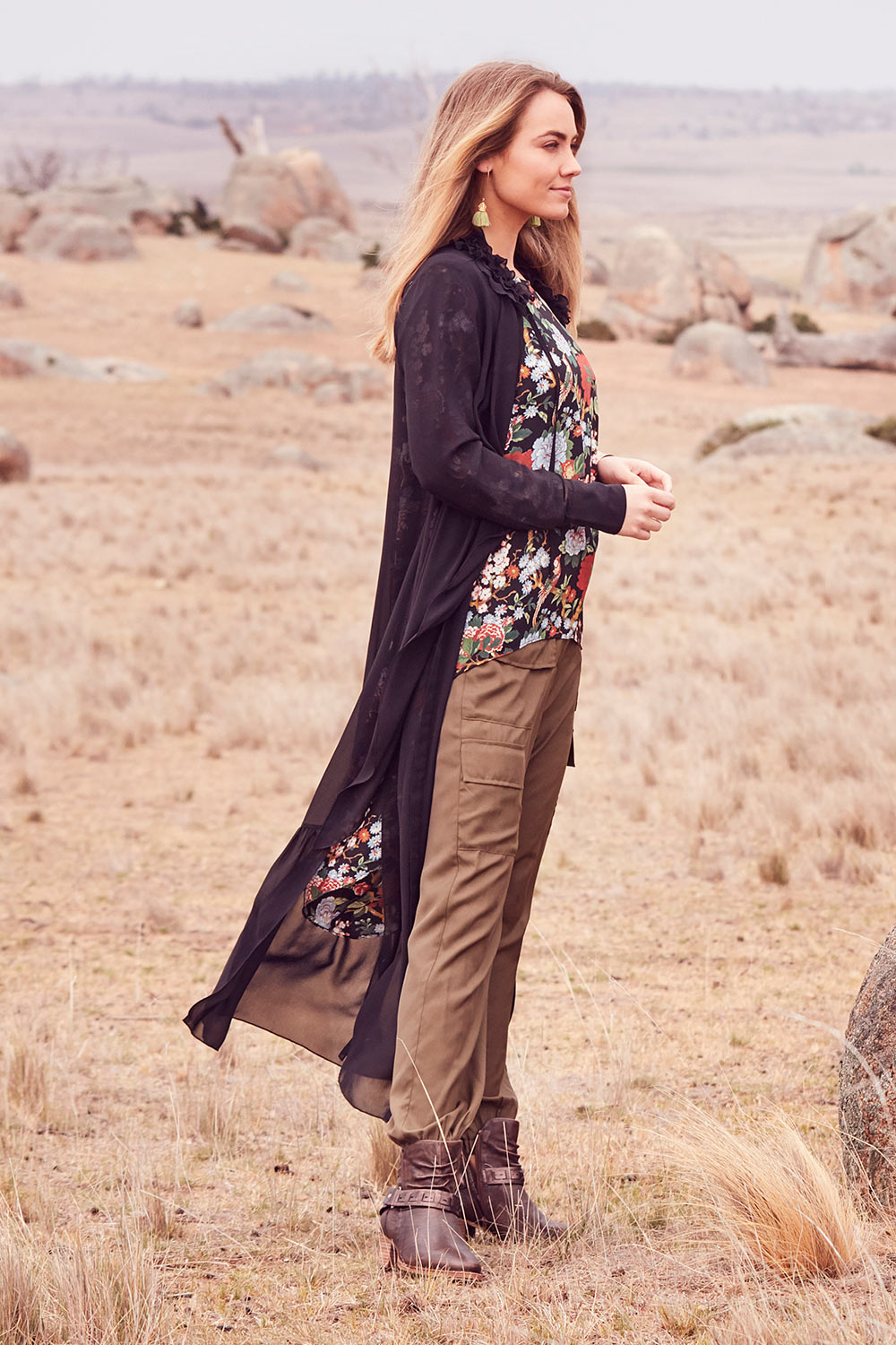 Model Marnee wearing size 10 of the Breezing Along Duster in colour Black (Black), from the front, showing the whole outfit