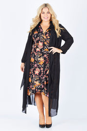 Model Sophie wearing size 18 of the Breezing Along Duster in colour Black (Black), from the front, showing the whole outfit
