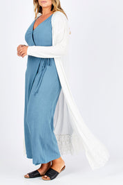 Model Fiona wearing size 16 of the Starry Night Cardi in colour Chalk (White), from the front, cropped image