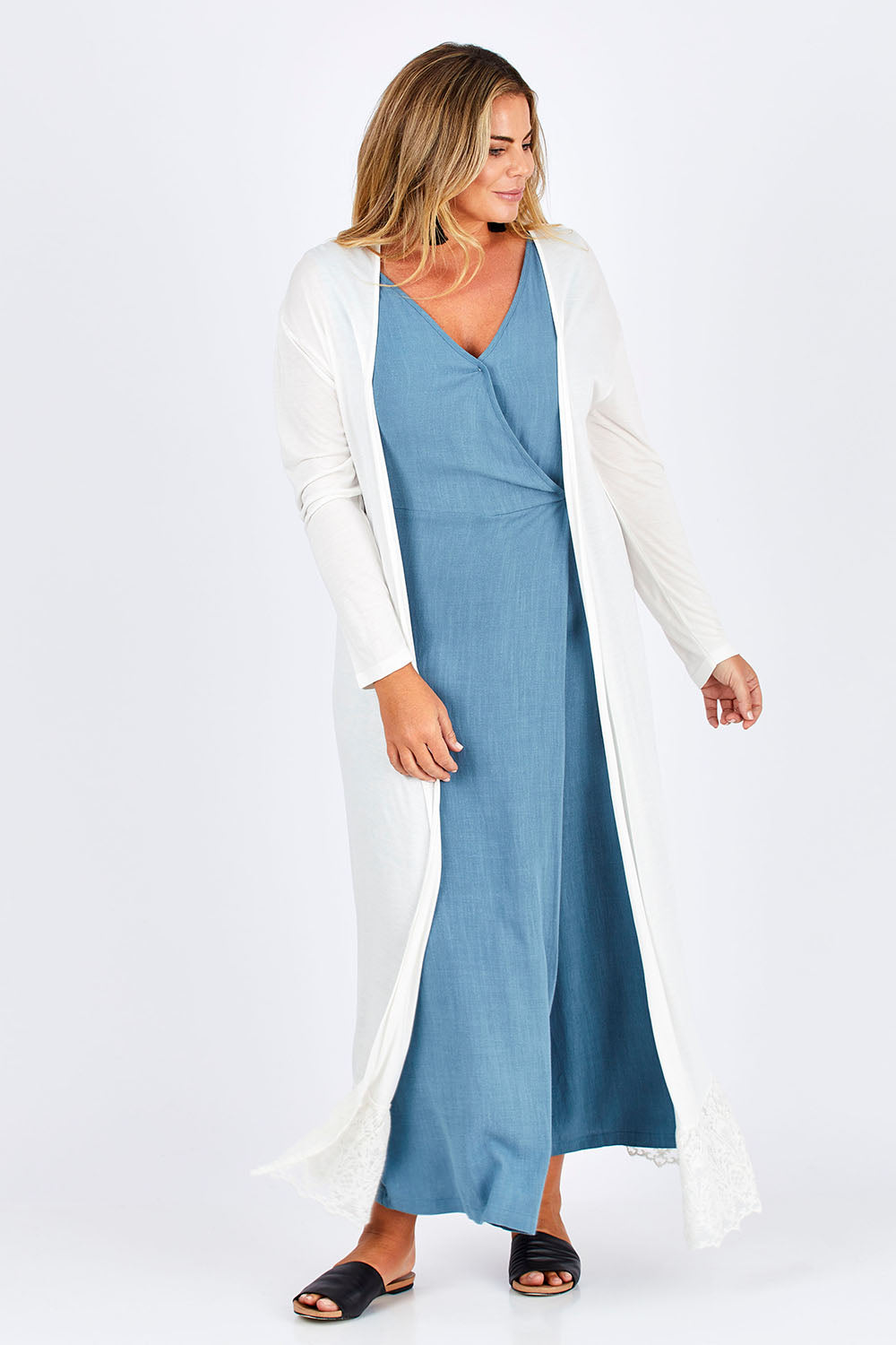Model Fiona wearing size 16 of the Starry Night Cardi in colour Chalk (White), from the front, showing the whole outfit